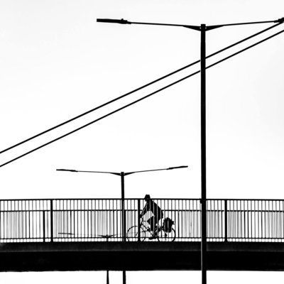 Cyclist on the overpass