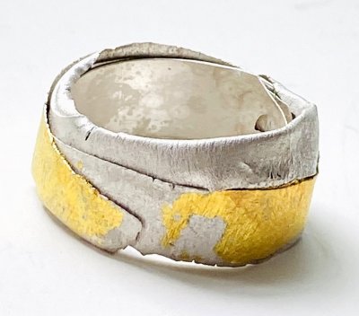 Twisted silver ring with gold leaf