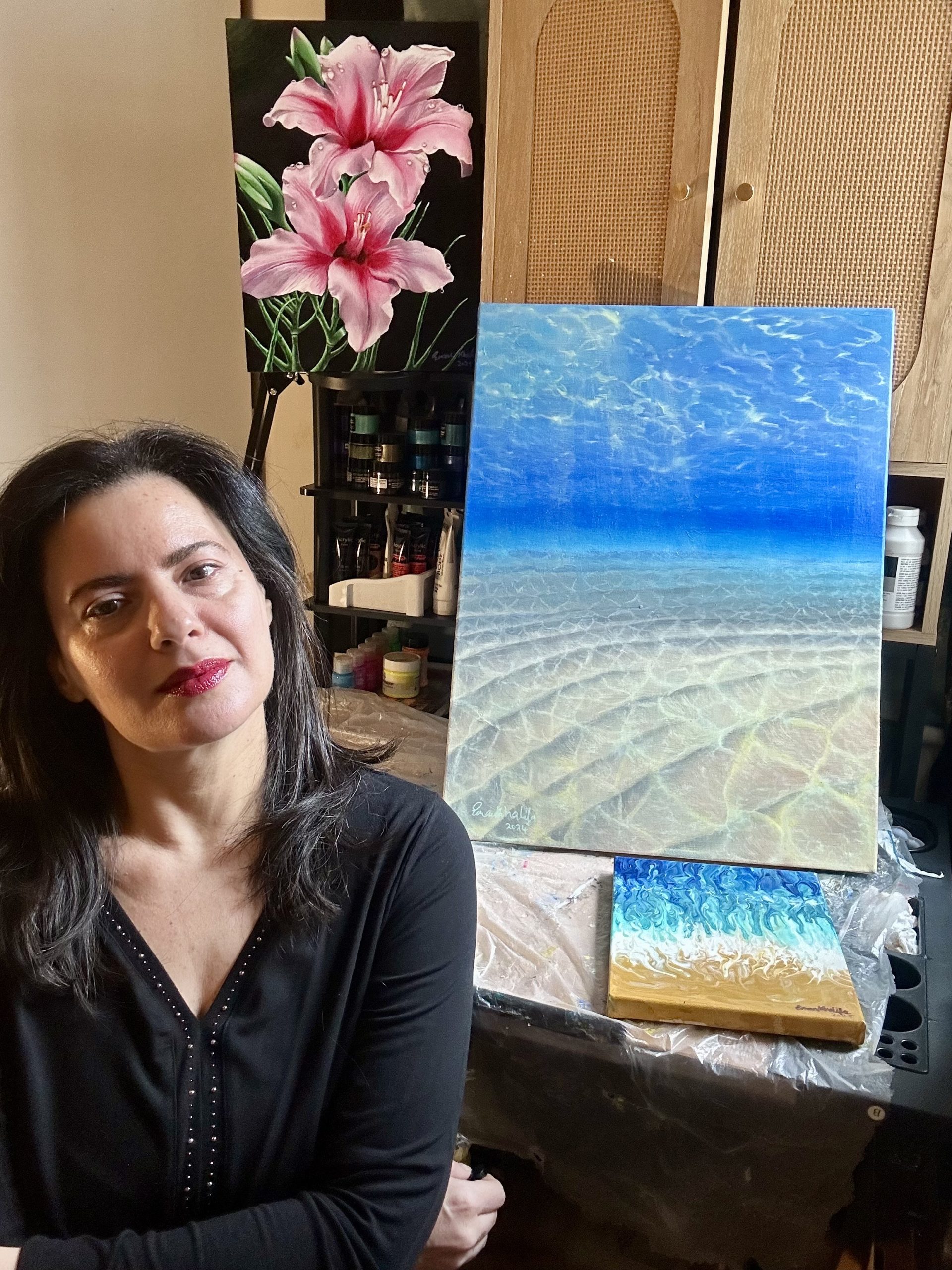 Eman Khalifa in Studio with Nature Paintings